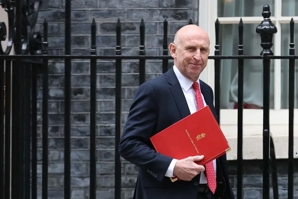 Autumn Budget 2026 summary for Surrey small businesses, with a shopfront on a Dorking high street