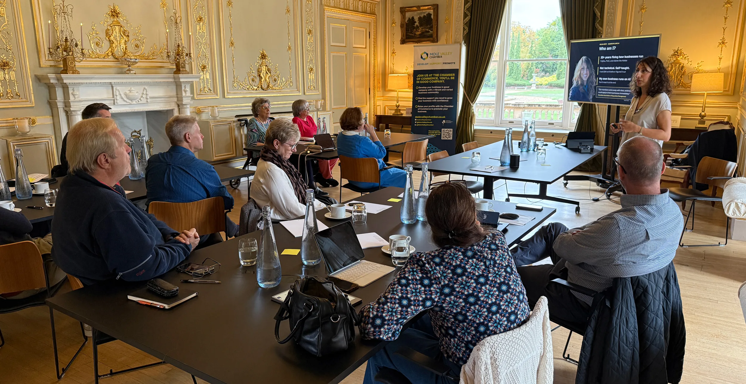 ai-workshop-small-businesses-fetcham-park-house Selda Seyfi of Quantum Lane AI presenting at Mole Valley Chamber’s AI workshop for small businesses